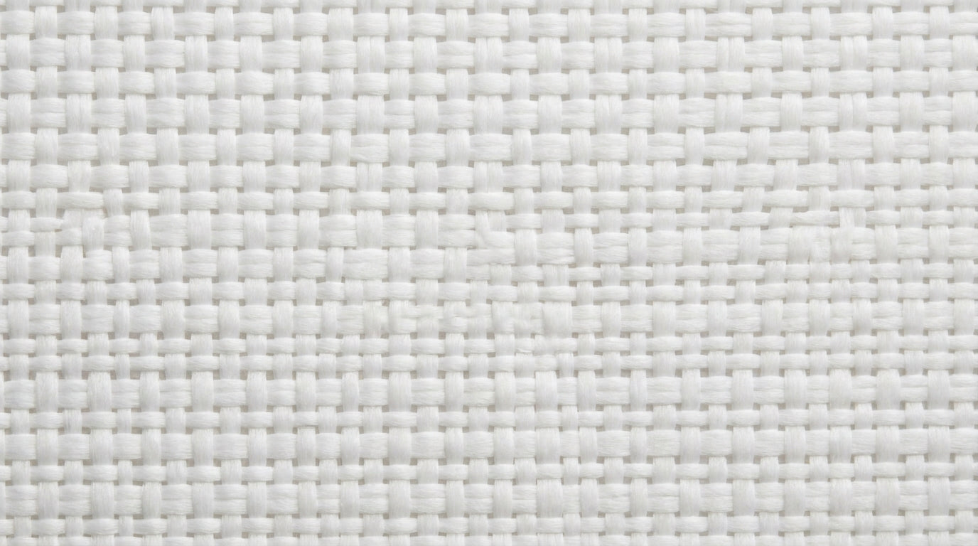 The heavy-duty, tight-weave fabric of a premium acoustic-grade golf simulator impact screen.